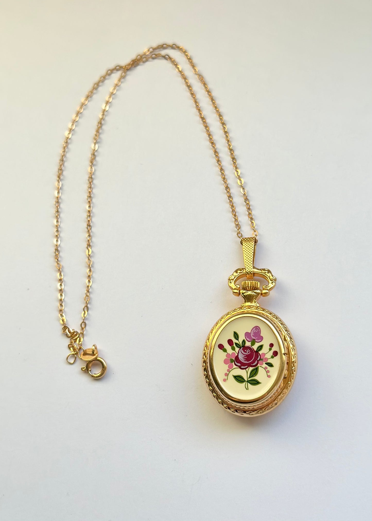 Hermes Flower Watch Locket Necklace (sells for £500)
