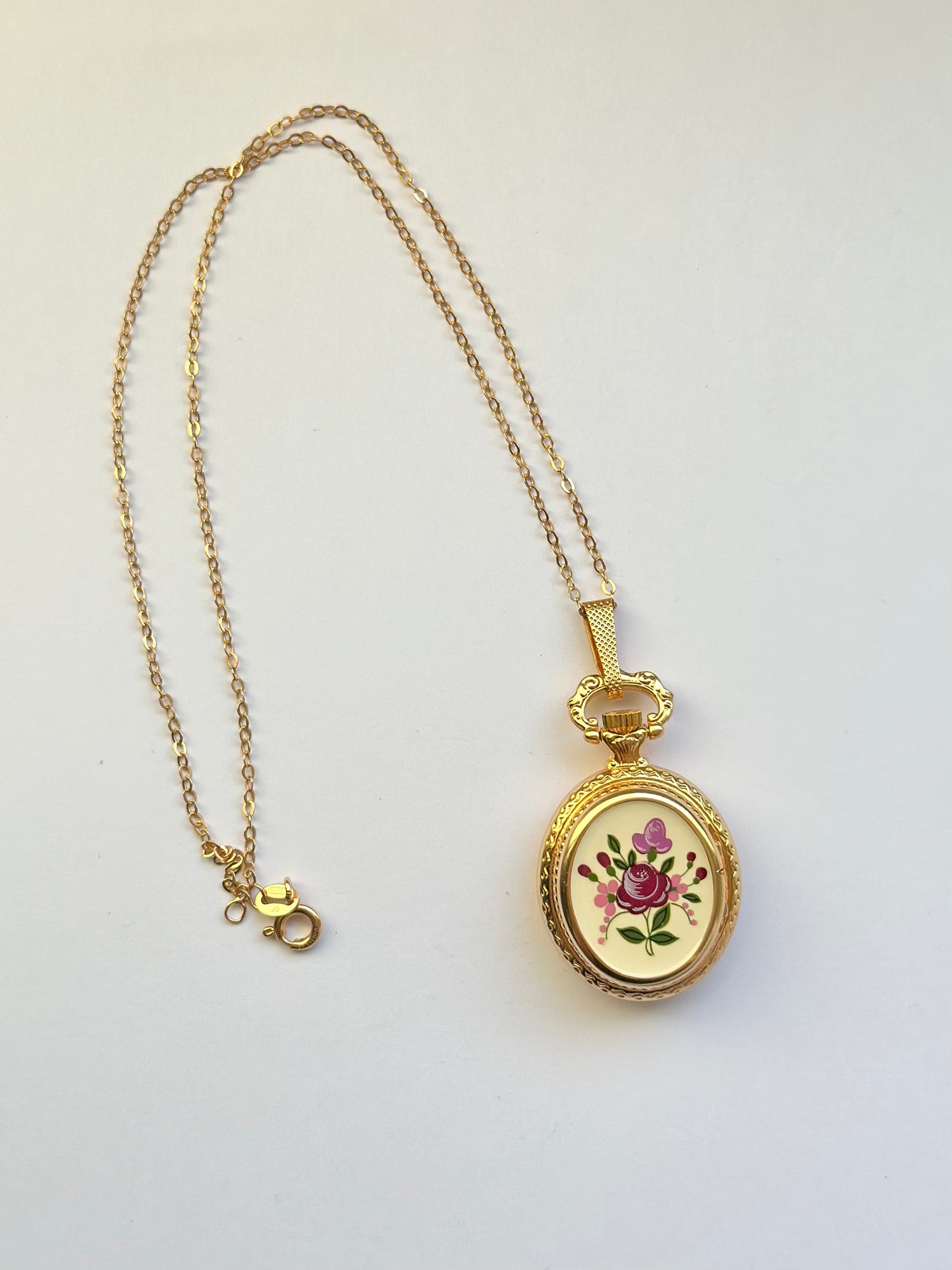 Hermes Flower Watch Locket Necklace (sells for £500)