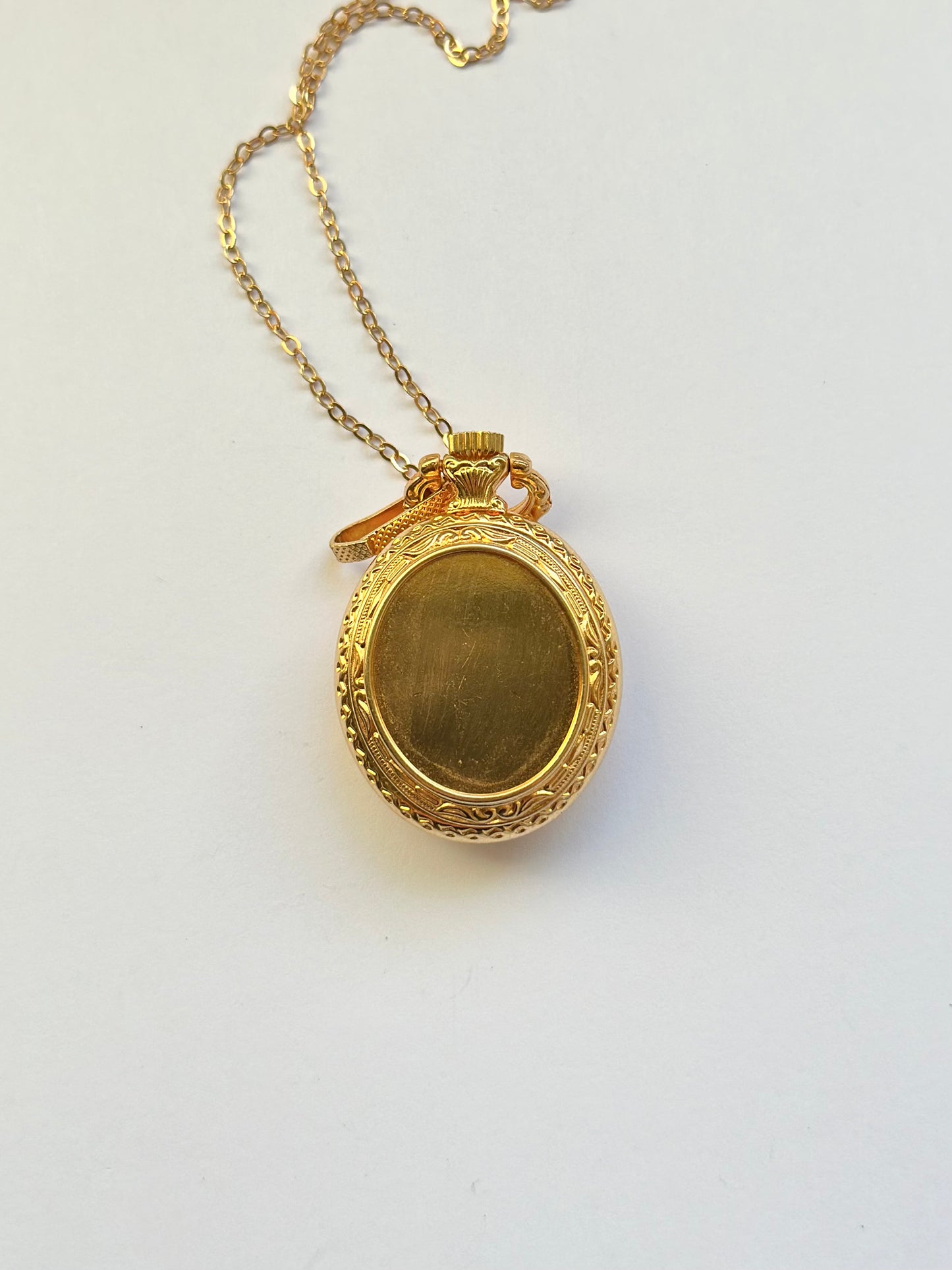 Hermes Flower Watch Locket Necklace (sells for £500)